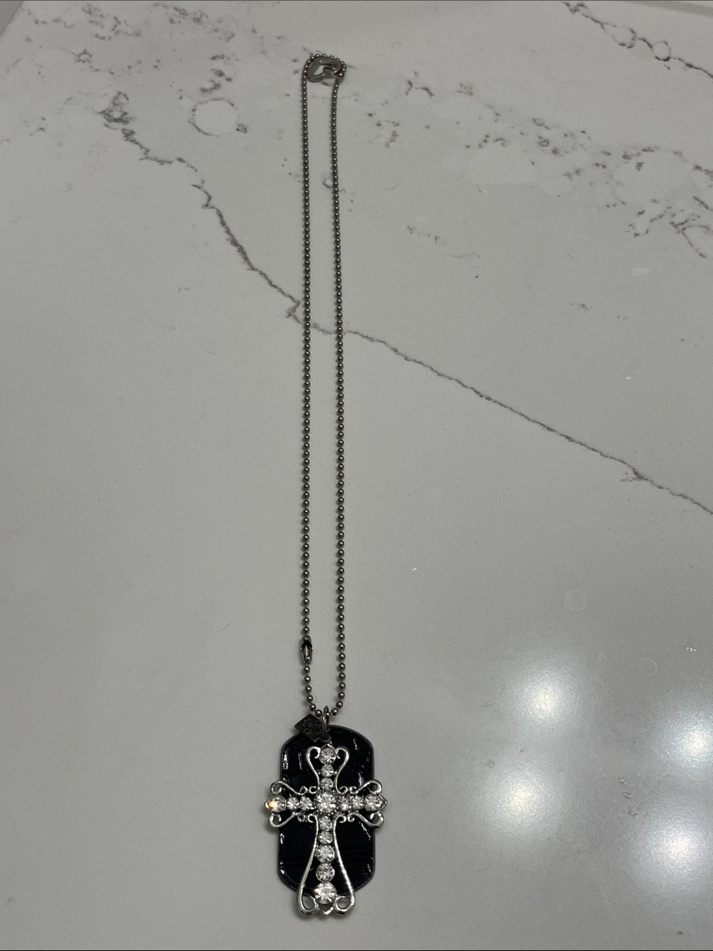Silver Cross Pendant Necklace on Black Pendant